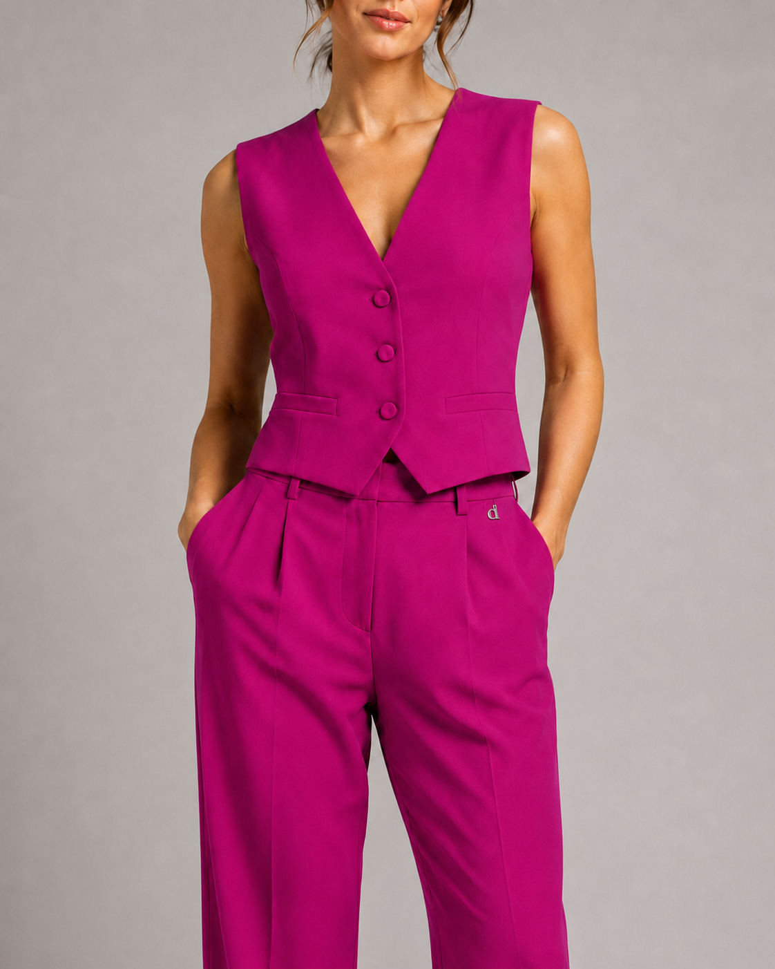 Tuta Dixie fucsia con gilet e pantalone