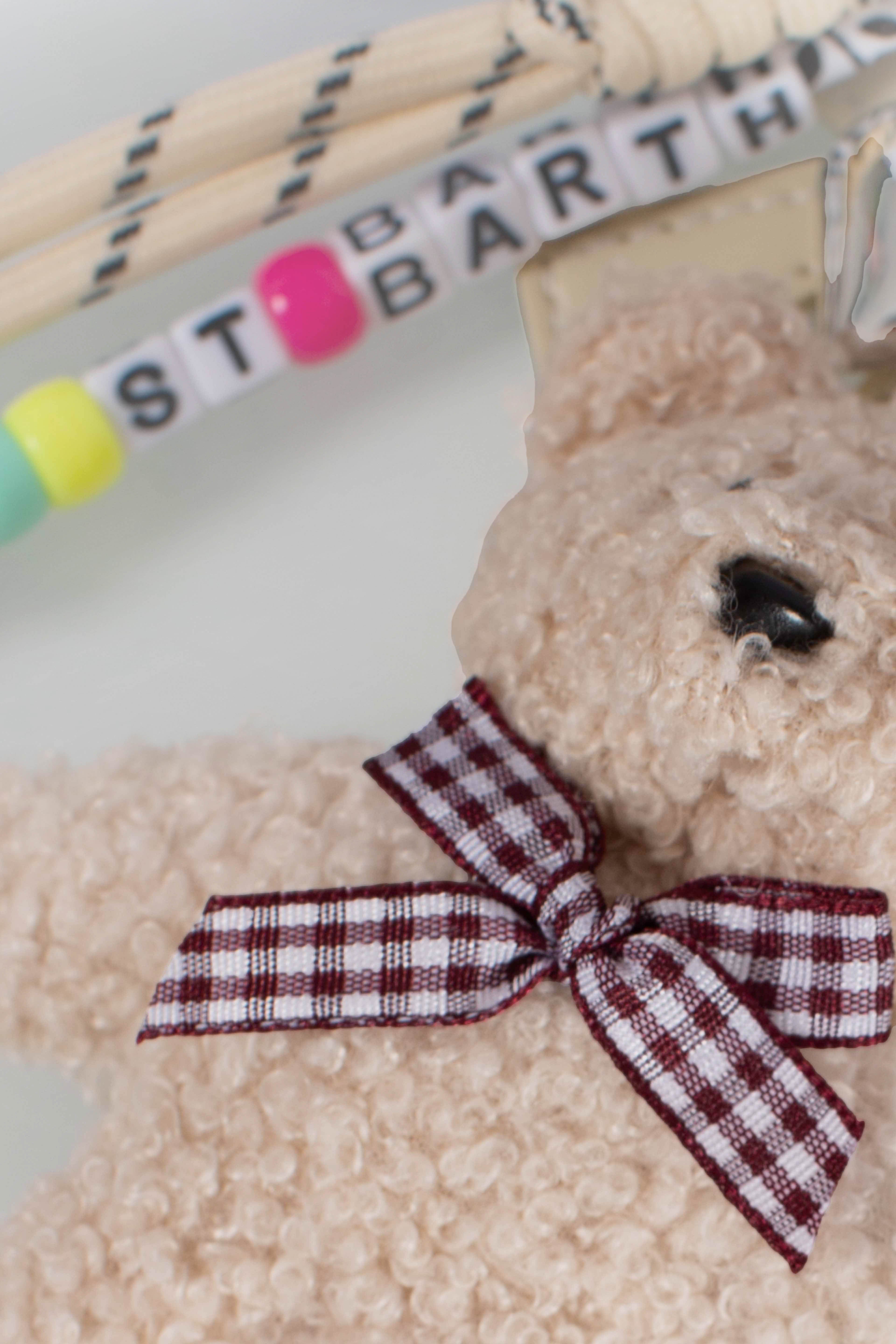 Funny Charm con fiocco imbottito e teddy decorativo
