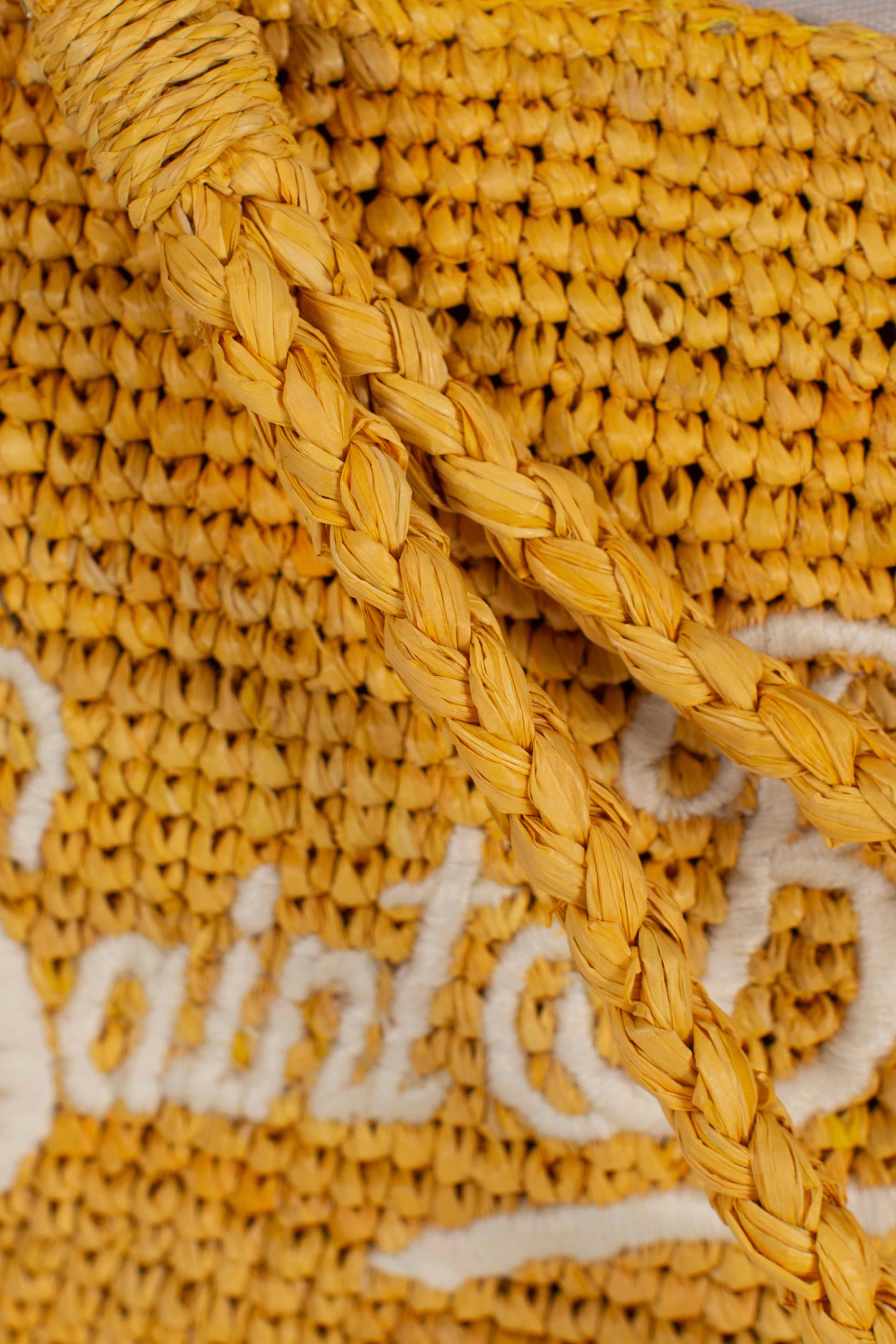 Pouch in rafia intrecciata yellow con logo ricamato