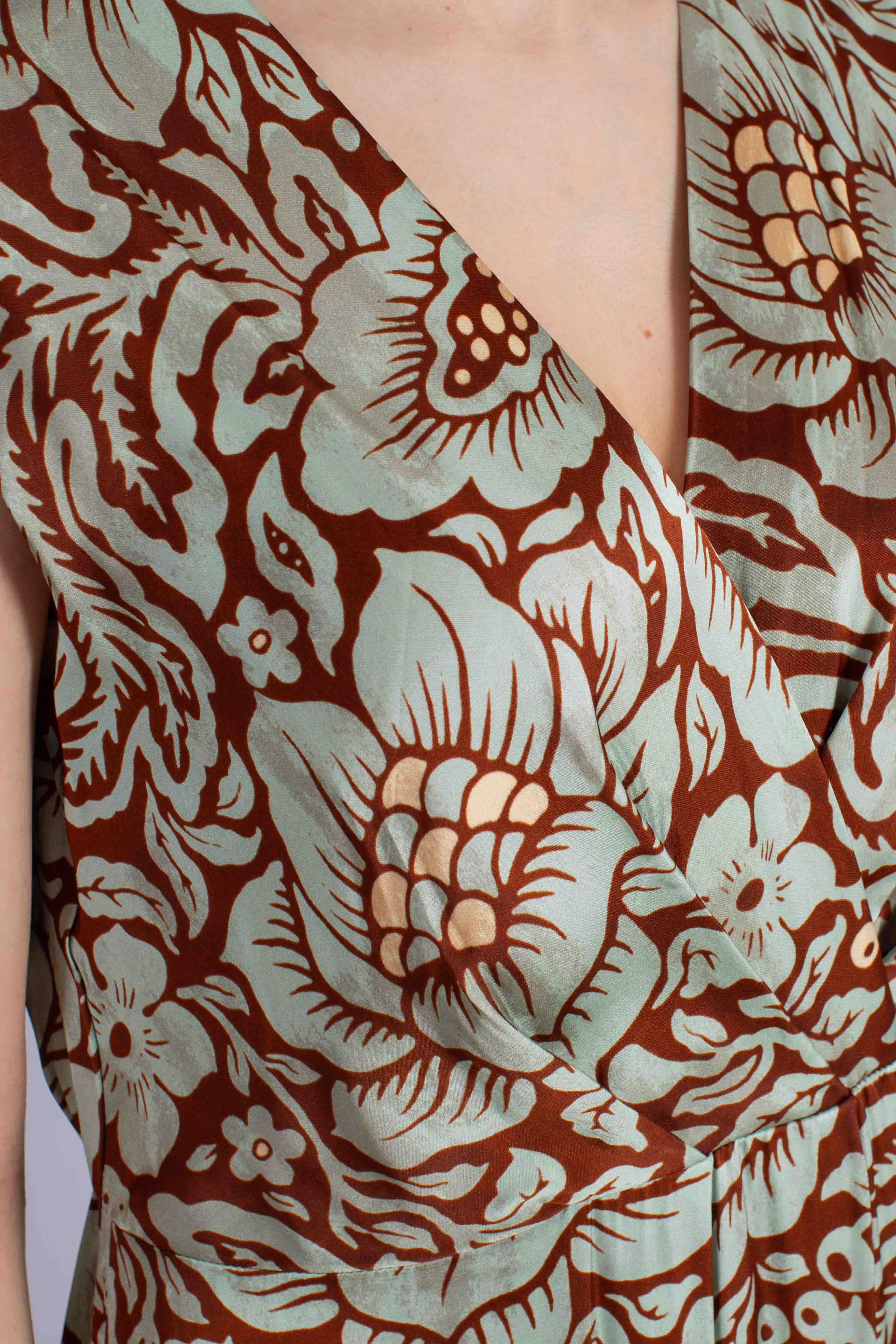 Abito lungo fantasia floreale con frange