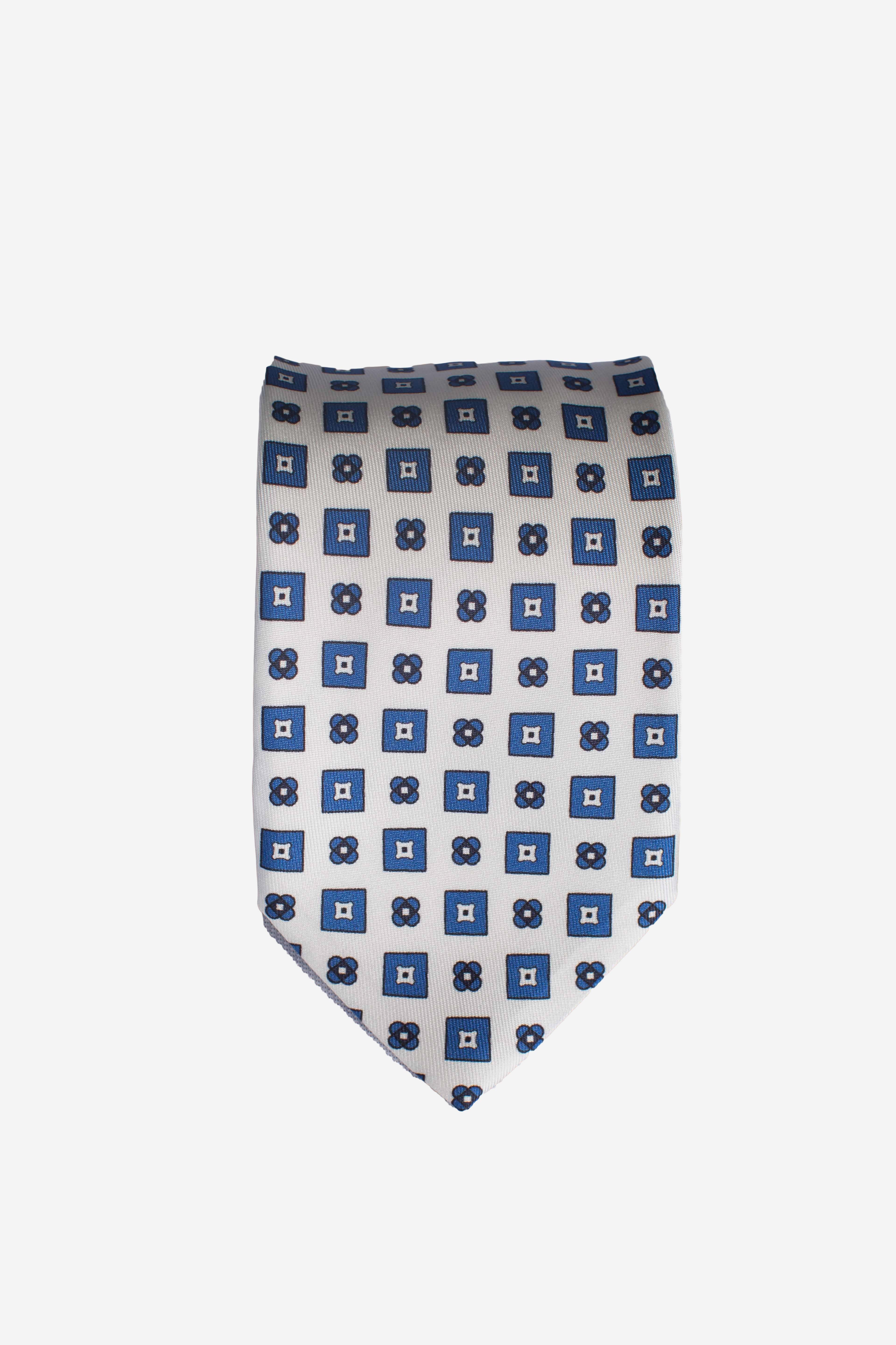 Cravatta in seta rombi fiori bianchi