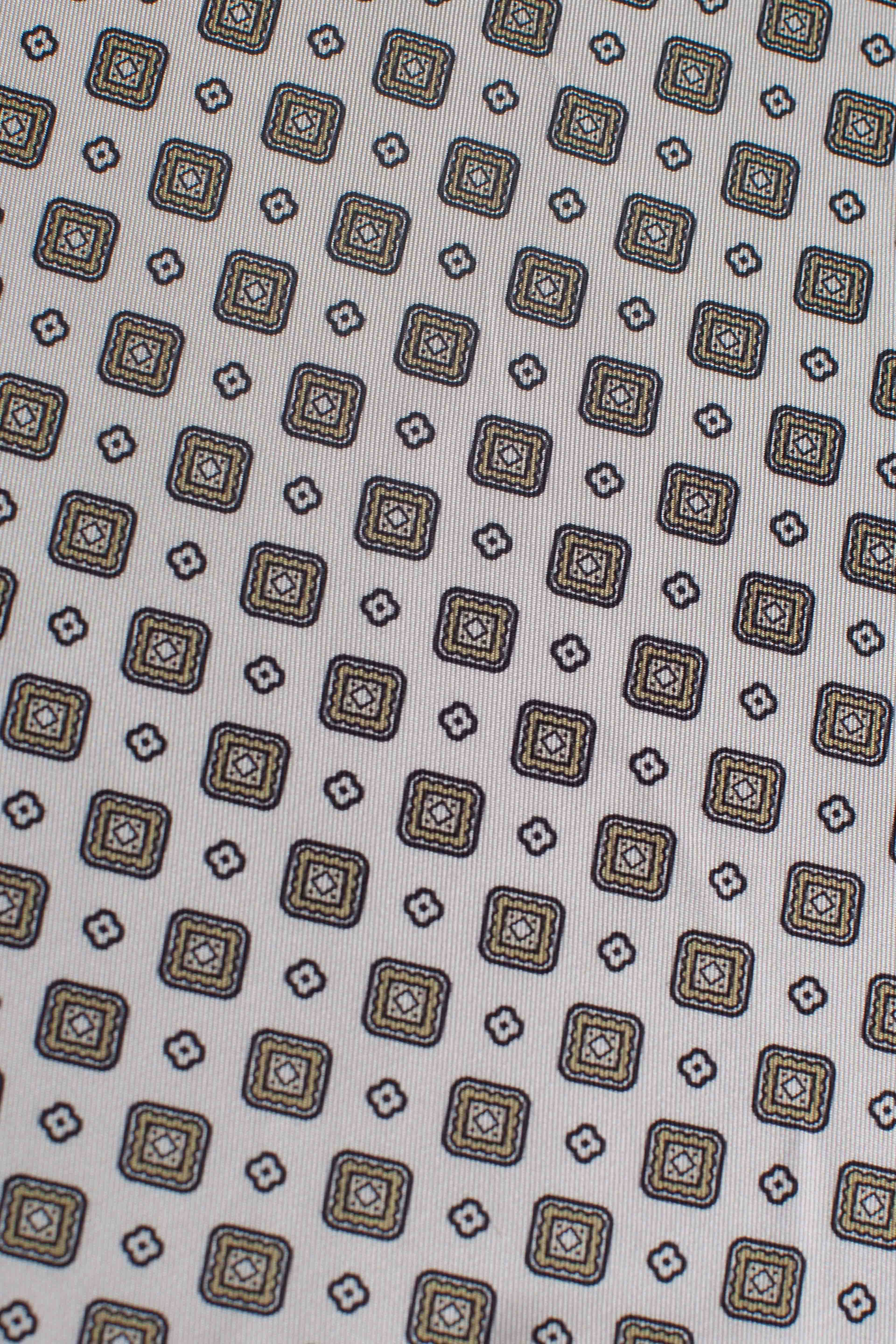 Pochette in seta semi rombi avorio