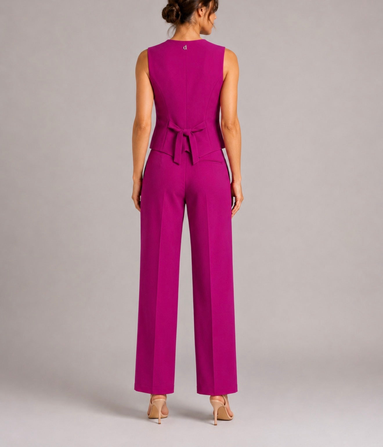 Tuta Dixie fucsia con gilet e pantalone