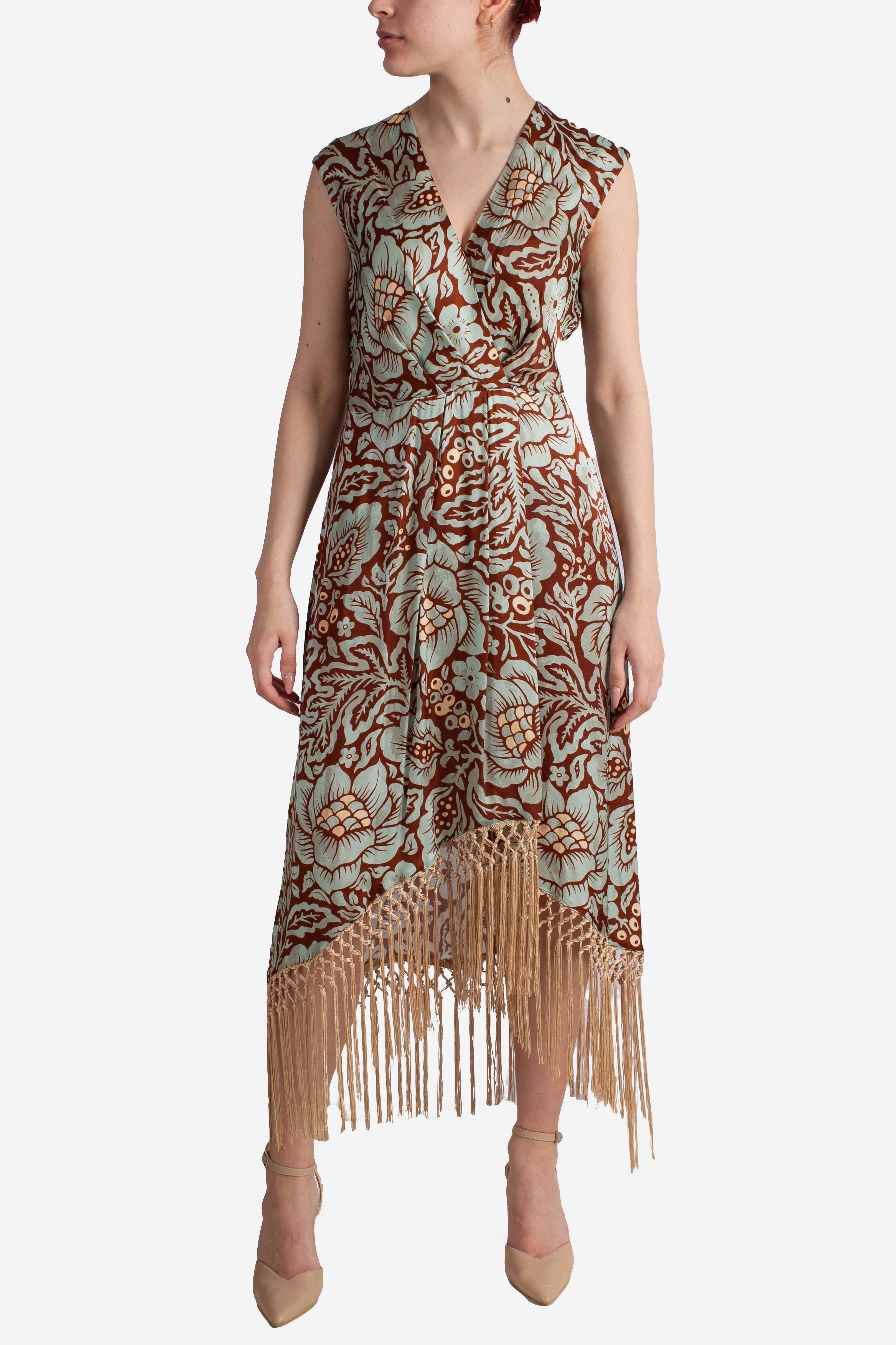 Abito lungo fantasia floreale con frange