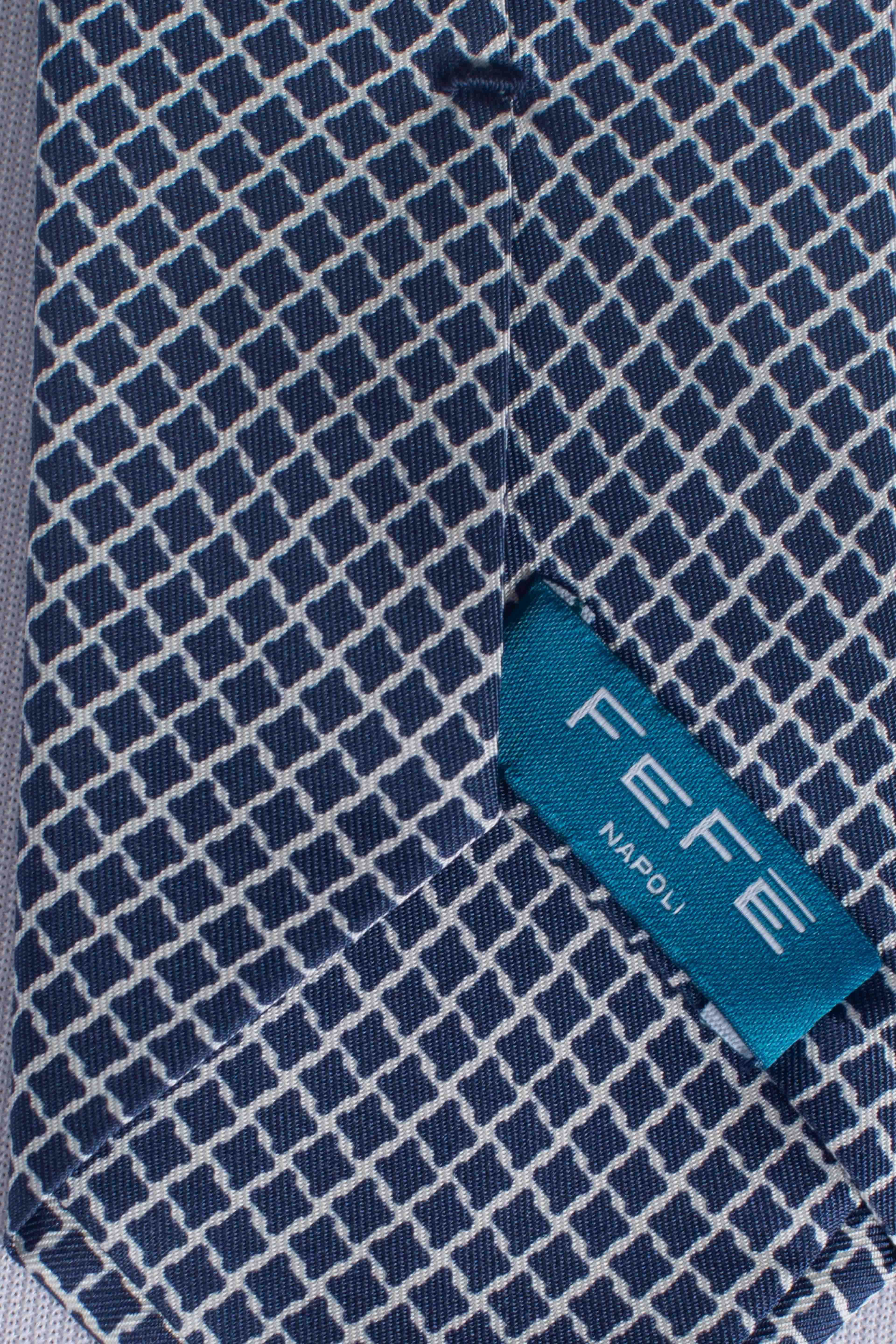 Cravatta in seta rombi blu bianco